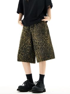 Unleash your wild side with these striking Leopard Print Wide-Leg Bermuda Shorts.
Crafted with a nod to vintage American leisurewear, these shorts boast a timeless leopard print on comfortable washed fabric. The wide-leg design ensures a versatile fit, making them an effortless addition to your relaxed yet stylish wardrobe.
Perfect for mixing and matching, pair these bermuda shorts with a sleek black top to let the print take center stage, or dress them down with a plain white tee for a casual d Wide Leg Cotton Bottoms In Leopard Print, Leopard Print Wide Leg Bottoms With Relaxed Fit, Trendy Relaxed Fit Leopard Print Bottoms, Casual Tiger Print Summer Bottoms, Casual Tiger Print Bottoms For Summer, Casual Summer Bottoms With Tiger Print, Leopard Print Cotton Shorts For Summer, Summer Leopard Print Cotton Shorts, Trendy Leopard Print Short Bottoms