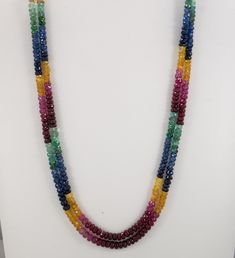 "Adjustable multi rainbow rondelle faceted necklace multi strand 2 layer faceted bead Jewelry Beaded Necklaces Adjustable Sapphire Necklace Product Details : Name : Multi Rainbow BEADED NECKLACE Gemstone Name : Ruby, Emerald, Sapphire Chain Style : BEADED Beads Shape : FACETED Rondelle Beads Size : 5-6 mm Approx. Length : 19\" Inch Approx. Weight : 315 Cts. Customization : **Available** Please Feel Free To Contact If You Have Any Query." Ruby Necklace Designs, Ruby Jewelry Necklaces, Beautiful Diamond Necklace, Gold Mangalsutra Designs, Diamond Necklace Designs, Long Statement Necklace, Mexican Jewelry, Fancy Beads, Earrings Design