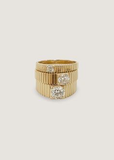 Inspired by Jennie's mother's vintage pleated ring, the Solis collection represents energy and strength. Our Solis Ring features a round brilliant diamond is prong set in a 14k solid gold ribbed band. 14k solid gold—always Non-hollow Average weight: 6.9g Band width: 6.8mm (front), 3.6mm (back) Diamond 4 C's: 1cw, Round Brilliant, VS2, G/H, Excellent Cut Custom sizing is available. Custom sized pieces are final sale. This piece cannot be resized. Our natural ring is made to order. Please allow at Timeless 14k Gold Ring With Fluted Bezel, Timeless 14k Gold Rings With Fluted Bezel, 14k Gold Ring With Fluted Bezel, 14k Gold Rings With Fluted Bezel, Classic Rings With Fluted Bezel, Timeless 14k Gold Jewelry With Fluted Bezel, Timeless Diamond Ring With Fluted Bezel, 14k Gold Rings With Fluted Bezel Round Cut, Diamond Ring With Fluted Bezel And Round Cut