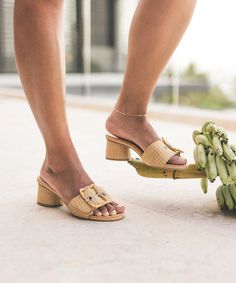 Understated, yet elevated. We've taken our most minimal heel silhouette and dressed it up with an oversized buckle for the perfect retro-chic touch. Be sure to add these to your beach bag before your next vacay. Raffia Upper Synthetic Outsole Synthetic Lining + Sock 2" Heel Height Imported Summer Ankle Strap Block Heels For Work, Chic Block Heels With Rectangular Buckle Closure, Chic Heels With Rectangular Buckle Closure, Summer Workwear Ankle Strap Block Heels, Summer Workwear Block Heels With Ankle Strap, Spring Block Heels With Stacked Heel And Rectangular Buckle, Casual Heels With Buckle Closure And Square Toe, Casual Square Toe Heels With Buckle Closure, Spring Heels With Rectangular Buckle Closure