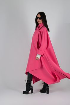 Winter Cashmere Coat, Pink Coat Women, Asymmetric Coat ►EUG Fashion offers handcrafted contemporary womenswear where fashion and freedom collide. ►Make a style statement with this gorgeous pink cashmere coat with long sleeves and cuffs. The impeccable quality of this cashmere coat makes it long-lasting, and stylish. ►Suitable for plus size. The model wears size M - 5,6' / 170 cm ►Materials & Care Made of: Wool, Cashmere Only dry cleaning ►All of our packages are sent out with tracked deliver Oversized Cape Outerwear For Spring, Pink Oversized Long Coat, Oversized Pink Long Coat, Chic Oversized Long Sleeve Cape, Oversized Long Sleeve Chic Cape, Oversized Chic Long Sleeve Cape, Oversized Long Sleeve Cape With Pockets, Modern Long Sleeve Raincoat For Spring, Oversized Pink Outerwear For Work