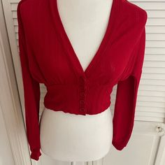 Forever 21 Red Crop Sweater. Button Up, Low Cut V Neck. New With Tags, Size Small. Forever 21 Buttoned Tops For Fall, Red Buttoned Tops For Fall, Red Tops With Button Closure For Day Out, Red Trendy Tops With Buttons, Trendy Red Tops With Buttons, Trendy Red Buttoned Tops, Red Long Sleeve Cardigan For Day Out, Trendy Red Top With Button Closure, Red Trendy Top With Button Closure