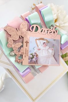 a card that has some pictures on it and butterflies around the edges, along with other cards