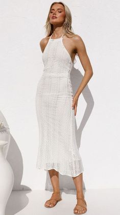 Details: Crochet knit Sleeveless Midi dress FIT:Regular fit Non-Stretch through fabricStandard sizingCottonPolyester Size Available: Size Length Bust inch cm inch cm S 39.4 100 33 84 M 39.7 101 34.6 88 L 40 102 36.2 92 XL 40.4 103 37.8 96 Chic Knit Halter Neck Dress, Chic Fitted Crochet Knit Dress, Fitted Knit Midi Dress For Beach, Fitted Knit Sleeveless Dress For Summer, Knit Bodycon Dress For The Beach, Fitted Knit Dresses For Summer, Fitted Crochet Knit Dress For Vacation, Stretch Knit Beach Dress, Elegant Fitted Sleeveless Crochet Dress