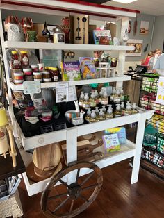 a store with shelves filled with lots of food and condiments on top of them