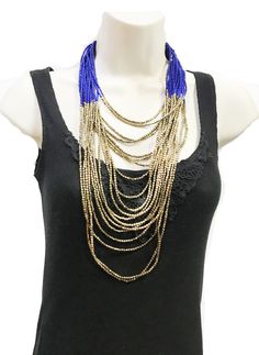 "beautiful long boho Beaded necklace, perfect for the upcoming holiday parties, beach parties etc. ** Long and Layering Necklace ** hand beaded jewelry ** Length of Necklace is 38 inches ** Perfect on a Little Black Dress or even a T-shirt. ** Make a statement with this stunning piece at the party! This beautiful necklace would make a great Gift for someone special. All Items come carefully wrapped in our branded boxes or bags. A complimentary message can be included on request. PRESS: \" TANEES Bohemian Beaded Long Layered Necklace, Bohemian Black Beads Necklace For Summer, Bohemian Summer Necklace With Black Beads, Bohemian Long Bib Necklaces For Party, Bohemian Long Bib Necklace For Parties, Bohemian Beaded Layered Necklace For Beach, Blue Necklace With Black Beads For Festival, Blue Necklaces With Black Beads For Festival, Summer Festival Multi-strand Beaded Necklaces