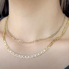 Our medium-weight Figaro chain necklace makes for a great everyday statement piece. Shown layered with our Heavy Mariner chain necklace, but can be worn on its own as a timeless classic.- Made with solid 14K yellow gold- Chain diameter: approx 3.0mm- Available in 16", 18", and 20" - Ready to ship in 1-3 days(Model is wearing a 16" with a 20" Heavy Mariner chain necklace) Metal Figaro Chain Choker Necklace, Classic Figaro Chain Metal Necklace, Gold-tone Pendant Chain Necklace With Figaro Chain, Gold-tone Figaro Chain Link Necklace, Gold-tone Metal Necklace With Figaro Chain, Figaro Chain Necklace, Anchor Chain, Figaro Chains, Necklace Chain Lengths