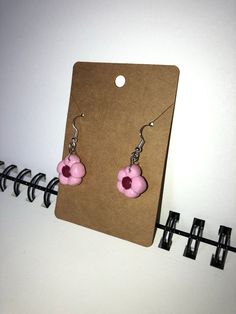 I made these clay earrings out of air dry clay, and when they were dried, I painted them! They were finished with super gloss mod podge! -can be made into clip ons  -super lightweight -backs included Pink Clay Dangle Earrings, Pink Clay Drop Earrings, Pink Clay Jewelry With Ear Wire, Cute Pink Hand Painted Earrings, Cute Hand Painted Resin Earrings, Cute Clay Drop Earrings, Pink Hand Painted Flower Drop Earrings, Hand Painted Pink Resin Earrings, Pink Flower Earrings With Resin And Ear Wire