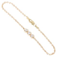 This diamond bracelet is truly beautiful! With three round diamonds in the center, totaling .45 carat and are set in 14k yellow gold. The bracelet measures 7 inches in length. Three Stone Diamond, Diamond Chain, Three Stone, Chain Bracelet, Diamond Bracelet, Round Diamonds, Jewelry Bracelets, Yellow Gold, Bracelet