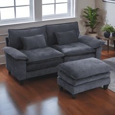 a couch and ottoman in a living room