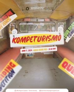 the inside of an old bus with some stickers on it