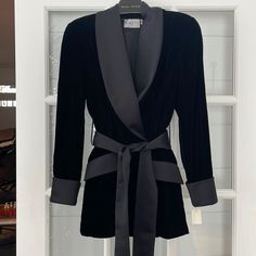 Oleg Cassini Black Tie Jacket In Velvet. Amazing Quality And Great For Any Special Occasion. Satin Sash Included. Sleeve: 24 Shoulders: 16 Length: 30.5 Elegant Black Cocktail Outerwear, Black Cocktail Outerwear For Fall, Elegant Black Cocktail Blazer, Long Sleeve Black Blazer For Cocktail Occasions, Long Sleeve Black Blazer For Cocktail Events, Black Long Sleeve Cocktail Blazer, Blazers Black, Black Velvet Blazer, Satin Sash