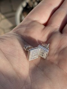 "Amazing stud earrings Solid 925 sterling silver! Wont turn your ears green! 2.8ct simulated diamonds Mix of icy baguette & round stones! SUPER ICY...Must see in the sun! About 0.4\" (10mm) wide perfect large size! Pair weighs around 3.9 grams Screw backs for a secure fit!" Silver Rectangular Cubic Zirconia Earrings, Sterling Silver Rectangular Earrings With Diamond Accents, Rectangular Sterling Silver Earrings With Diamond Accents, Silver Rectangular Diamond Earrings, Silver Diamond Earrings In Rectangular Shape, Rectangular Diamond Earrings In Silver, White Gold Sterling Silver Diamond-shaped Earrings, Gift Sterling Silver Diamond Cut Earrings, Diamond-shaped Jewelry With Pave Setting As Gift