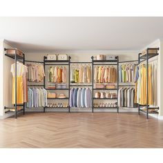 an open closet with clothes and shoes on the shelves in front of it is a wooden floor