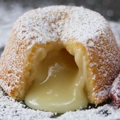 powdered sugar covered pastry with cream filling