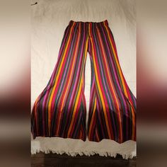 Never Worn Stretch Striped Free People Size Medium Retro Wide Leg Pants For Spring, Retro Wide Leg Pants For Festival, 70s Inspired Wide Leg Festival Pants, Retro Orange Bottoms For Spring, Orange Stretch Bottoms For Festival, Summer Stretch Pants Inspired By 70s, Orange Wide Leg Festival Pants, Red Wide Leg Hippie Pants, Retro Multicolor Wide Leg Bottoms