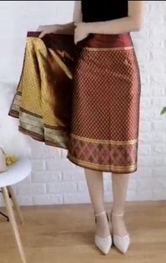 Dimensions Waist : 24-33 Inches. Hip : 36-40 Inches. Length: 27-29 Inches; Material: Silk Thai Wrap around with hook.(ตะขอ) ผู้ซื้อต้องเย็บตะขอติดเอง Use for : Thai skirt product of Thailand. Luxury Silk Bollywood Skirt, Cheap Traditional Fitted Skirt, Silk Skirt Free Pattern, Chinese Wraps, Thai Skirt, Asian Traditional Fashion, Traditional Thai Clothing, Thai Wedding Dress, Thai Fashion