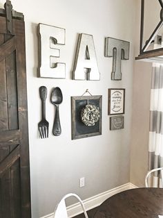 an instagram photo with the caption'eat'on it and some pictures hanging on the wall