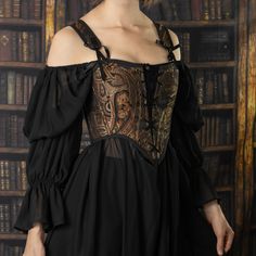 This black paisley corset is a timeless classic for Renaissance Faires. Swirls of gold, orange, and grey heavily decorate this jacquard fabric in an intricately woven paisley pattern. Our High Back Renaissance Bodice is inspired by historical corsets and bodices of yore. Reinforced with more boning than our classic Renaissance Bodices, and complete with both front and back lacing for an extra adjustable fit, this corset is sure to be a staple in your Renaissance Festival wardrobe. The Musketeers Constance, Black Renfaire Outfit, Lena Hoschek Tradition, Dark Ren Faire Costume, Dark Ren Faire Outfit, Renfaire Outfit Dark Fairy, Fairy Look Outfit, Modern Corset Outfit, Medieval Inspired Outfits