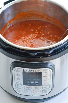 a close up of a pot of food on top of an instant pot cooker