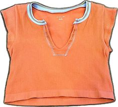 Orange V-neck T-shirt For Summer, Trendy V-neck Tops From Urban Outfitters, Casual Burnt Orange Crew Neck Top, Trendy Orange Crop Top, Trendy Orange Short Sleeve Top, Orange Cotton Tops For Spring, Trendy Burnt Orange Tops For Spring, Orange Relaxed Fit Tops, Trendy Orange Urban Outfitters Top