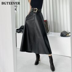 Brand Name: BGTEEVERSilhouette: A-LINEMaterial: PolyesterMaterial: Faux LeatherDecoration: SashesOrigin: CN(Origin)Waistline: Natural FactorsPattern Type: SolidStyle: CasualDresses Length: Mid-CalfAge: Ages 18-35 Years OldFabric Type: BroadclothGender: WOMENModel Number: BY6145item type: women PU leather skirts Long Leather Skirt, Pu Skirt, Pu Leather Skirt, Leather Skirts, Mid Calf Dresses, Waist Sash, Female Shorts, Drawstring Dresses, Women's Robe