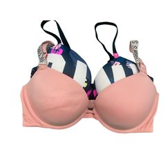 A Set Of 2 Bras 1-Victoria’s Secret - Light Pink With Fat Straps That Has Gemstones That Write Out In Black Victoria’s Secret. Does Have Small Mark On The Back Of The Bra. Tag Was Some How Cut. 2- Pink - Navy Blue And Multicolor Bra With White Lettering That Says Pink. Both Size 36d Both Have Adjustable Straps To Make A Cross Back Both Are Push Up Bras New With Tags Refer To Pictures For Condition E27 Soma Bras, Velvet Bra, Cacique Bras, Free People Bralette, Pretty Bras, Tommy John, Coverage Bras, Halter Bralette, Blue Bra