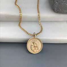 Please check the dimensions to be sure about the size! 2.7 x 1.7 cm (with the bail) 1.7 x 1.7 cm (without the bail) The inner dimensions of the bail: about 2.5 x 3.5 mm Chain options: - Chain No1: about 1mm (thickness) - Chain No2: about 2mm (thickness) - Chain length: 40cm /15,7 inches 45cm /17,7 inches 50cm /19,6 inches 55cm /21,6 inches 60cm /23.6 inches ✔Material of pendants: Solid gold 14k ✔Material of chains: Solid gold 14k ✔Metal Stamp: 585 (for 14k) ✔Backside engraving without extra cost Gold Jewelry With Large Cross Pendant, Gold Oval Coin Pendant Jewelry, Gold Oval Pendant With Coin Detail, Gold Plated Spiritual Medallion Jewelry, Gold Oval Pendant Spiritual Jewelry, Gold Spiritual Locket Jewelry And Charms, Gold Plated Spiritual Round Pendant, Spiritual Yellow Gold Coin Pendant, Symbolic Gold Jewelry With Square Pendant