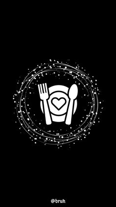 a plate with a fork and knife on it, in the shape of a heart