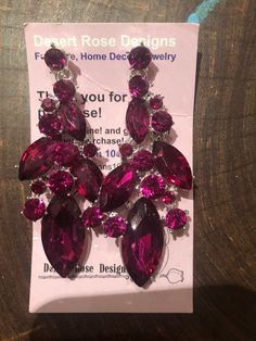 Purple Rhinestone Party Earrings, Purple Rhinestone Crystal Earrings For Party, Party Purple Crystal Rhinestone Earrings, Purple Rhinestone Earrings For Party, Rose Red Dangle Earrings For Party, Purple Rhinestone Drop Earrings, Purple Rhinestone Dangle Earrings, Purple Dangle Earrings With Rhinestones, Rose Red Drop Earrings For Party