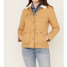 This Shyanne Women&Apos;S Canvas Barn Jacket In Coffee Color Is Perfect For The Outdoorsy Women. It Has A Mid-Length Design And A Collared Feature That Will Keep You Warm During The Winter And Fall Seasons. The Jacket Has A Zip And Snap Closure And Is Made Of Cotton Outer Shell Material And Polyester Lining Material. The Canvas Fabric Type Gives It A Durable And Rugged Look That Is Perfect For Travel And Other Outdoor Occasions. The Jacket Features Accents Of A Logo And Is Available In Size Xs. Winter Cotton Utility Jacket With Fleece Lining, Fitted Cotton Utility Jacket With Flap Pockets, Fitted Cotton Utility Jacket For Fall, Cotton Outerwear With Flap Pockets For Fall, Fall Cotton Outerwear With Flap Pockets, Long Sleeve Cotton Utility Jacket For Cold Weather, Cotton Long Sleeve Utility Jacket For Cold Weather, Beige Cotton Outerwear With Fleece Lining, Long Sleeve Cotton Outerwear With Fleece Lining