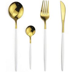 three forks, two spoons and one knife on a white surface with gold colored handles