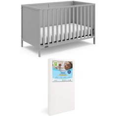 a baby crib and mattress next to each other