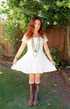 This Fully Lined Vintage Fishnet Crochet Skater Dress Is A Simple, Chic, And Flattering Wardrobe Staple. It Would Work Perfectly For Festivals, Burning Man, Coachella, Around The Town, etc. It Would Also Make For a Fabulous Wedding Reception Dress. - Fully Lined And Quality Made - Tailored, Flattering Fit With A Touch Of Flare. - Off White Fishnet Crochet - Fabric Has Plenty Of Stretch - Short Sleeves With Scooped Neckline  Excellent Vintage Condition  Measurements taken laying flat and doubled. We recommend that you measure, laying flat, an item of clothing that fits you well. Double and compare to our measurements for a good fit  Size: Small  Bust: 32+ inches Empire Waist: 27+ inches Hips: Open Length: 32 inches Bohemian Short Sleeve Fitted Lace Dress, Bohemian Fitted Short Sleeve Lace Dress, Bohemian Fitted Lace Dress With Short Sleeves, Casual Knee-length Lace Dress, Casual Fitted Lace Dress With Lace Trim, Casual Fitted Lace Trim Dress, White Crochet Dress For Fall, Casual Fitted Mini Dress With Lace Patchwork, Casual Fitted Lace Dress