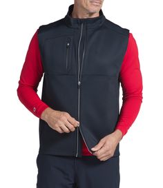 From IBKUL&#x2C; this vest features:This unique (Mega Heat) technology will be sure to become your go-to choice for cool&#x2C; unseasonable conditionsWind resistant and water repellent4-way stretch for unrestricted range of motion comfortstand collarsleeveless Zip front closureChest zip pocketPolyester/polyurethaneMachine wash; tumble dry Imported. Athleisure Men, Golf Shop, Modern Lifestyle, Mens Outerwear, Dillard's, Range Of Motion, Athletic Wear, Stand Collar, Vest Jacket