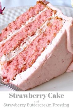 a slice of strawberry cake on a plate with a fork and flowers in the background