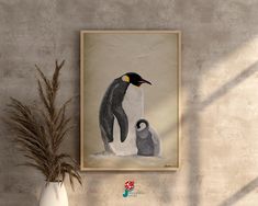 an image of a penguin and its chick on the wall next to a potted plant