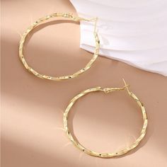 Anthropologie Gold Twisted Hoop Earrings Height: 2” Width: 2” Elegant Hoop Earrings With Gold-tone Hardware, Modern Twist Gold-plated Hoop Earrings, Gold Hoop Earrings With Gold-tone Hardware, Anthropologie Jewelry Earrings, Twisted Yellow Gold Hoop Earrings, Tarnish Resistant, Twisted Hoop Earrings, Hypoallergenic Adjustable 14k Gold-filled Hoop Earrings, Anthropologie Jewelry, Faux Pearl Earrings