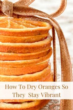 a stack of oranges with the words how to dry oranges so they stay vibrant