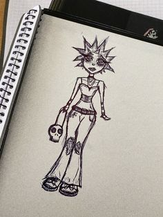 a drawing of a girl holding a skull on top of a notepad next to a pen