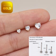 Metal: 14k solid gold, Available Gold color: Yellow gold  Guaranteed Authentic : 14k Solid Gold，Not Gold Plated or Gold Filled Stone:  CZ Thickness:0.82mm (20G) Stamp:14k ★Every ear is different, the length of backings that most suitable for your ear will depend on your ear thickness ★Titanium is a very safe metal, so we don't plate it, in order to avoid some people are allergic to the plating material. NOTE The item combined by 14k solid gold and implant grade titanium push in back,  Sold as single piece, packed in a beautiful Jewelry Box   SHIPPING ADDRESS All the orders will ship to the supplied address through your Etsy Order, Please leave your phone number,will give to carrier for safe deliver. We will not send and replacement parcels due to incomplete or inaccurate address.  PACKING Gold Heart-shaped Body Jewelry As Gift, 14k Gold Tarnish-resistant Piercings As A Gift, Anniversary White Gold Cartilage Earrings Tarnish Resistant, Gold Heart-shaped Elegant Piercings, Gold Pierced Jewelry For Valentine's Day, Elegant Gold Heart-shaped Piercings, Elegant Gold Heart Piercings, Gold Heart Jewelry With Internally Threaded Details, Internally Threaded White Gold Cartilage Earrings For Anniversary