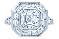 an octagonal cut diamond ring with baguets in the center and side stones on each side