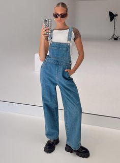 Overalls   100% cotton  Mid wash denim  Adjustable shoulder strap   Large chest pocket   Four classic pockets   Button fastening at hips   Wide leg    Non-stretch  Unlined Campus 00, Long Overalls, 00s Style, Overalls Denim, Aesthetic Baby, Friday Outfit, Pink Formal Dresses, Fleece Dress, Sweatshirt Set