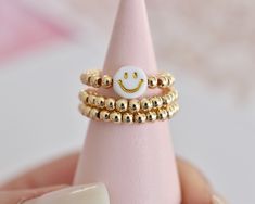 Gold Filled Smiley Face Ring Stacking Rings Beaded Ring - Etsy Trendy Yellow Gold Midi Rings As Gift, Smiley Face Adjustable Jewelry For Gifts, Adjustable Smiley Face Jewelry Gift, Adjustable Smiley Face Jewelry For Gifts, Hypoallergenic 14k Gold Filled Stackable Rings As Gift, Hypoallergenic Stackable 14k Gold Filled Rings As Gift, Hypoallergenic Stackable Rings In 14k Gold Filled As Gift, Playful Gold Jewelry With Smiley Face, Trendy Yellow Gold Stackable Rings For Gift