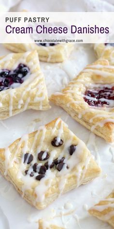 puff pastry cream cheese danishes with blueberries on top and chocolate chips in the middle