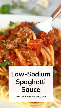 a fork full of spaghetti sauce with the words low - sodium spaghetti sauce above it