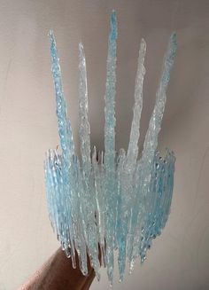 The Glacial Blue Ice Queen Crown headdress has 5 intricately formed, spectacular, transparent, glistening icicles surrounded by multiple layers of smaller glistening ice shards, all in beautiful variegated transparent glacial blue, just like glacial ice.  Now available with added iridescence to each icicle and ice shard! See the video and select 'with' or 'without' iridescence at the checkout.  To help ensure the headdress stays in place on every individual head shape, there is an option to have Ice Queen Headpiece, Ice Queen Crown, Ice Accessories, Ice Costume, Ice Shards, Ice Crown, Ice Queen Costume, Ice Dress, Crown Costume