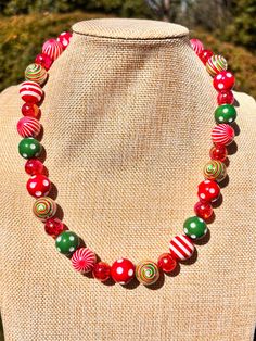 The necklace in picture is 21 inches Beads are acrylic  Swirly, polka dots, peppermint beads are 16mm Red crackle bead is 12mm Playful Red Jewelry With Colorful Beads, Playful Red Adjustable Necklace, Fun Red Adjustable Necklace, Playful Red Beaded Jewelry, Red Crackle, Beaded Necklaces, Peppermint, Favorite Jewelry, Beauty Book