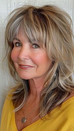 20 Flattering Bangs Hairstyles for Older Women to Try Now | Lookosm Joy Behar Hairstyles, Shag Haircut With Bangs Medium, Feathered Hairstyles With Bangs, Bangs For 50 Year Old Women, Long Bang Hairstyles, Layered Haircuts For Medium Hair With Bangs, Hair Styles With Bangs Over 50 Medium, Drape Bangs, Medium Length Hair Cuts With Bangs