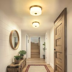 the hallway is clean and ready for us to use as an entrance way in this home